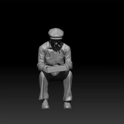 Civilian sitting looking at lunchbox smoking