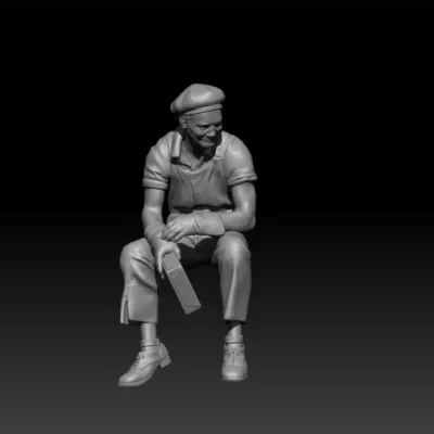 Civilian sitting with lunchbox in hand