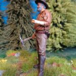 Gold digger with nugget in hand photo review