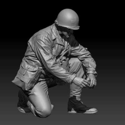 American GI medic crouching