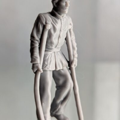 Soldier on crutches, kepi