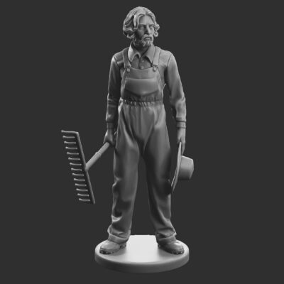 Farmer standing with rake in hand