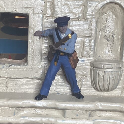 Click to view full screen Alamo Volunteer holding friends back photo review