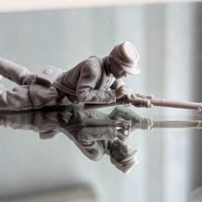 Union soldier on ground loading rifle