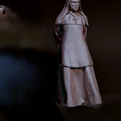 Clergy nun standing hands behind