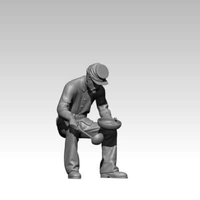 Union soldier sitting scooping up meal