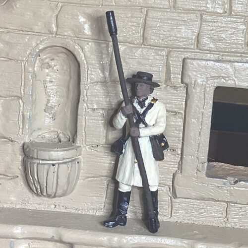 Click to view full screen Alamo Defender standing with ramrod photo review