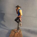 Cowboy leaning wall photo review