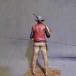 Cowboy with rifle over shoulder photo review