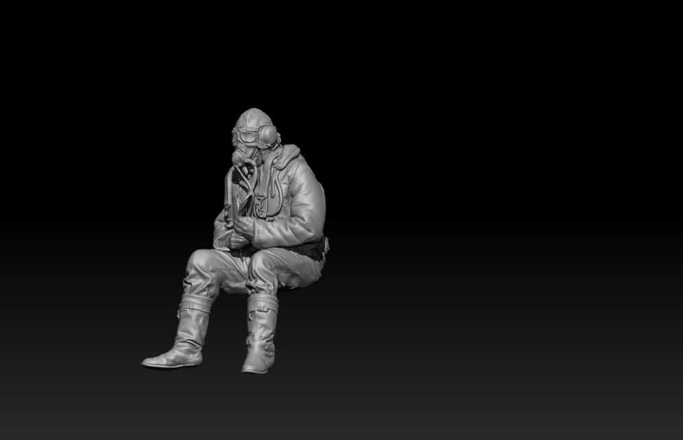 British WW2 pilot sitting in airplane