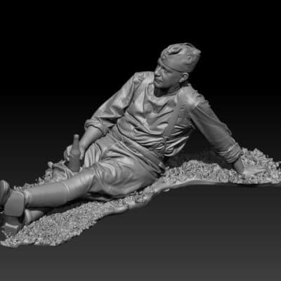 Finnish soldier resting with a bottle of beer, WWII