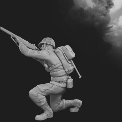 US Soldier crouching aiming up D-Day Omaha Beach