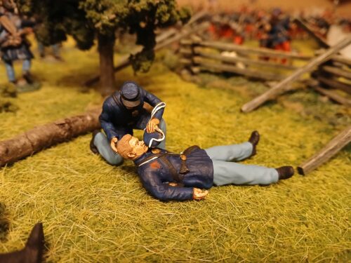 Civil war Union soldier helping injured comrade with a drink photo review